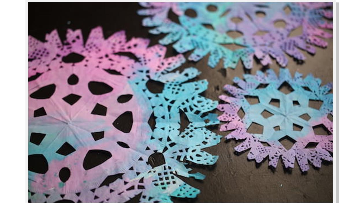 Colorful doilies shaped like snowflakes