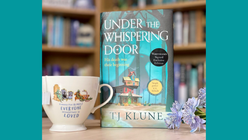 Under the Whispering Door book cover and tea cup.