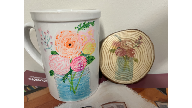 floral transfer art on a mug